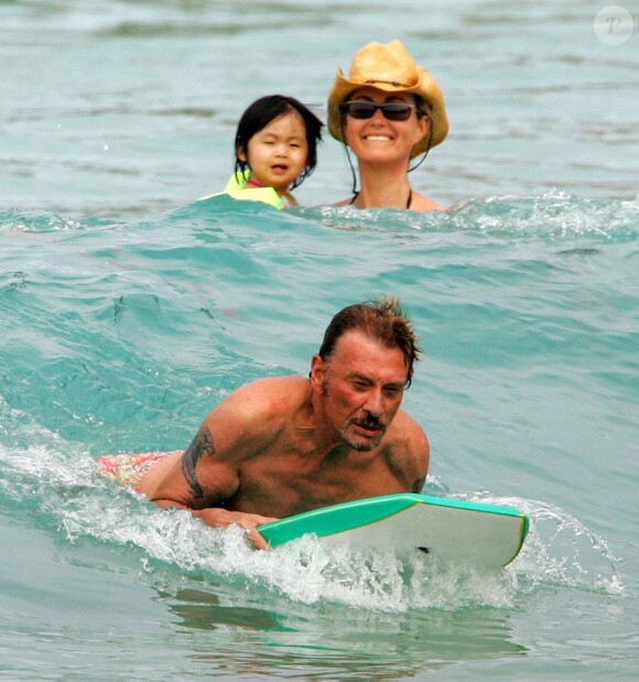 Johnny Hallyday, sa femme Laeticia et leur fille Jade à St Barth en février 2006