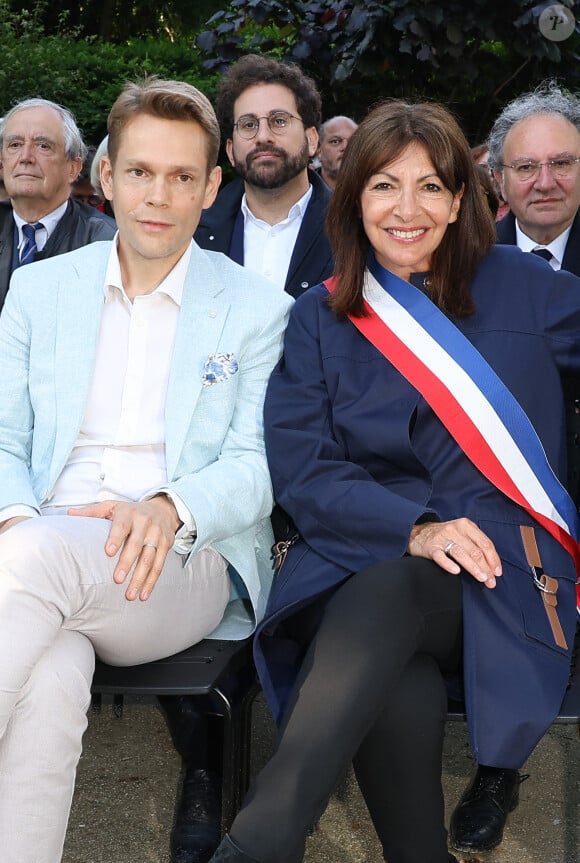 Nicolas Aznavour et Anne Hidalgo - Inauguration du Jardin "Charles Aznavour", Avenue des Champs-Elysées à Paris à l'occasion du Centième anniversaire de sa naissance, le 22 mai 2024. © Coadic Guirec/Bestimage 