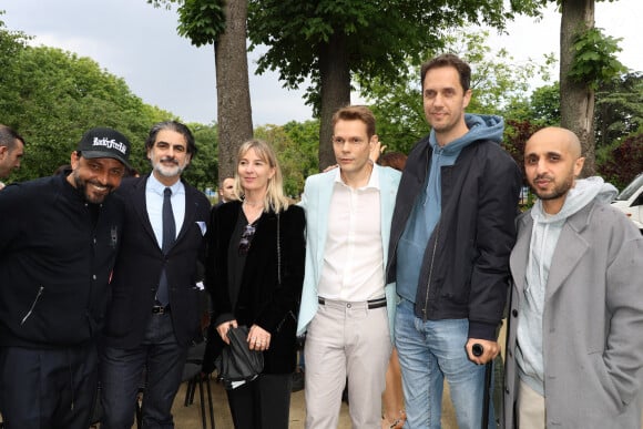 Jean-Rachid, Stéphane Hasbanian, Katia Aznavour, Nicolas Aznavour, Grand Corps Malade et Mehdi Idir - Inauguration du Jardin "Charles Aznavour", Avenue des Champs-Elysées à Paris à l'occasion du Centième anniversaire de sa naissance, le 22 mai 2024. © Coadic Guirec/Bestimage 