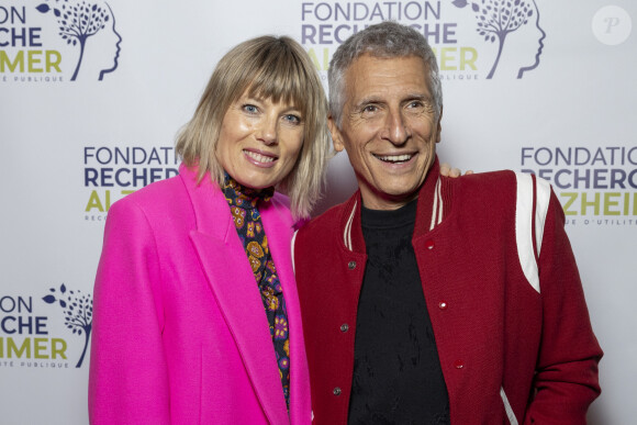 Nagui et sa femme Mélanie Page au photocall du concert du gala des 20 ans de la fondation Recherche Alzheimer "2 générations chantent pour la 3ème" à l'Olympia à Paris le 18 mars 2024. © Cyril Moreau / Bestimage 