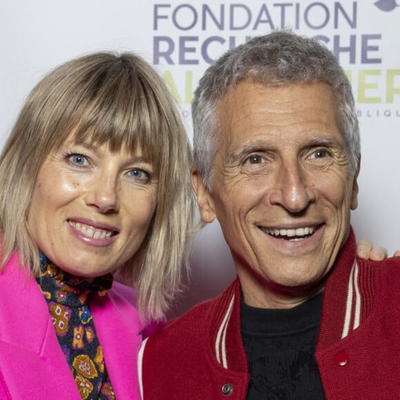 Nagui et sa femme Mélanie Page au photocall du concert du gala des 20 ans de la fondation Recherche Alzheimer "2 générations chantent pour la 3ème" à l'Olympia à Paris le 18 mars 2024. © Cyril Moreau / Bestimage 