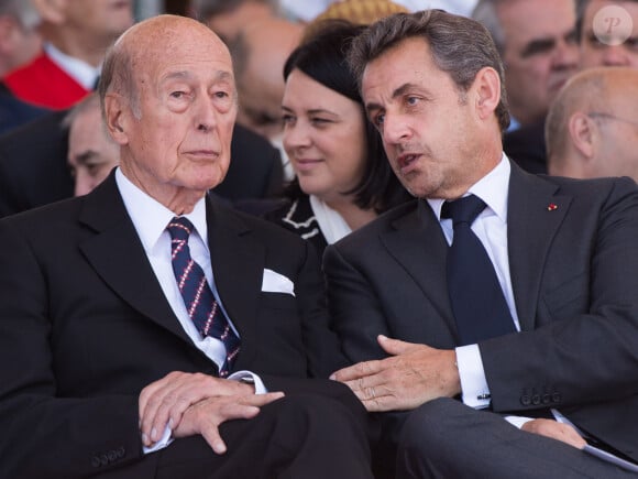 Lors d'un colloque consacré à Valéry Giscard d'Estaing, ce dernier a été d'un grand soutien comme le rapporte "Paris Match"
Valéry Giscard d'Estaing et Nicolas Sarkozy - Cérémonie de commémoration du 70ème anniversaire du débarquement sur la plage Sword Beach à Ouistreham. Le 6 juin 2014