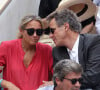 Comme elle l'a révélé à ''La Tribune Dimanche'', la journaliste signe chaque année une déclaration de conflits d'intérêts.
Anne-Sophie Lapix et Arthur Sadoun dans les tribunes lors des Internationaux de France Roland Garros 2023 le 11 juin 2023 à Paris. Nasser Berzane/ABACAPRESS.COM