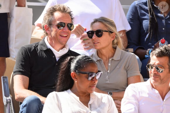 Anne-Sophie Lapix et son mari Arthur Sadoun assistent aux Internationaux de France à Roland Garros le 4 juin 2023 à Paris. Laurent Zabulon/ABACAPRESS.COM