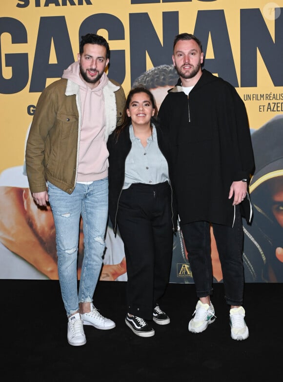 Pour cause, ils sont à l'affiche des "Infaillibles", leur nouveau film qui sortira le 20 juin prochain sur Prime Video.
Mickaël Montadir, Inès Reg et Kevin Debonne - Avant-première du film "Les Gagnants" au Grand Rex à Paris le 11 avril 2022. © Coadic Guirec/Bestimage