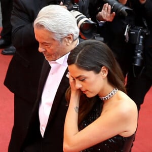 Alain Delon et sa fille Anouchka Delon à la montée des marches du film "A Hidden Life" lors du 72ème Festival International du Film de Cannes, le 19 mai 2019