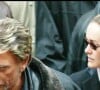 En larmes au moment de l'annonce, le chanteur s'était rendu aux obsèques. 
Johnny Hallyday et sa femme Laeticia - Obsèques de Ticky Holgado à l'église Saint Roch