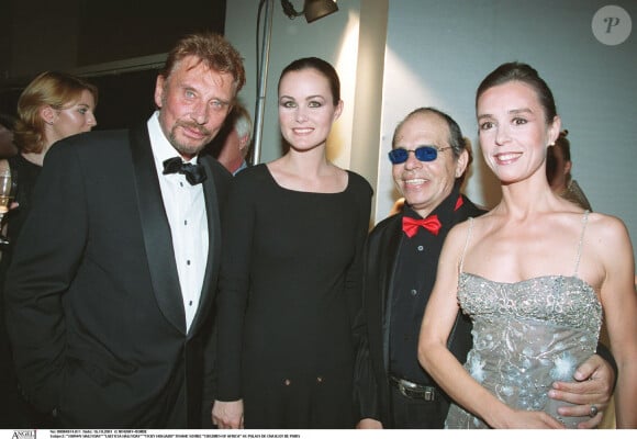 Car Ticky Holgado, ensuite devenu acteur, a été le secrétaire particulier de Johnny Hallyday. 
Johnny Hallyday, Laeticia Hallyday et Ticky Holgado - Soirée 'Children of Africa' au palais de Chaillot de Paris