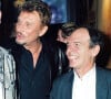 Johnny Hallyday et Ticky Holgado étaient très amis. 
Pascal Nègre, Johnny Hallyday, Ticky Holgado et Philippe Lavil dans les loges du concert de David Hallyday à l'Olympia.