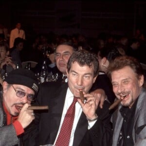 Ils se connaissaient depuis leur jeunesse. 
Ticky Holgado, Martin Lamotte et Johnny Hallyday - Soirée amateurs de cigares