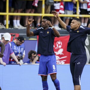 Kylian Mbappé - Echauffement de l'équipe de France, avec la participation de Kylian Mbappé, avant le match France Vs Pologne à l'Euro 2024 de football à Dortmund, le 25 juin 2024. © Elyxandro Cegarra / Panoramic / Bestimage