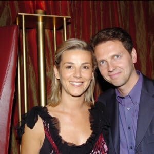 


Laurence Ferrari et son mari Thomas Hugues - soirée Trophée des Champions à l'Etoile à Paris, en 2004.



