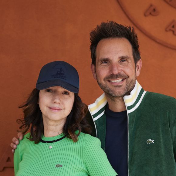 "J'ai cru mourir de douleur", a avoué celle qui est désormais tirée d'affaire. 
Delphine Michalak et son mari Christophe Michalak au village lors des Internationaux de France de tennis de Roland Garros 2024, à Paris, France, le 4 juin 2024. © Jacovides-Moreau/Bestimage