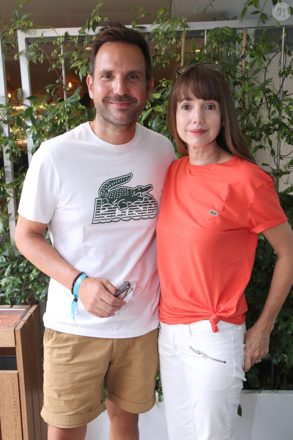 Exclusif - Christophe Michalak et sa femme Delphine McCarty - Célébrités aux Internationaux de France de Tennis de Roland Garros 2023 - Jour 13 à Paris le 09 Juin 2023. © Bertrand Rindoff / Bestimage