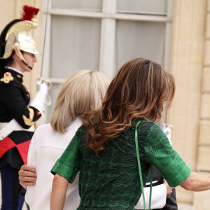 Le Président de la République française, Emmanuel Macron et la première dame Brigitte Macron reçoivent le Roi Abdallah II de Jordanie et la Reine Rania, pour un déjeuner de travail au Palais de l'Elysée à Paris, le 24 juin 2024