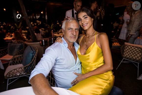 David Ginola et sa compagne Maeva Denat - Les people font la fête à la Gioia à Saint-Tropez. Eté 2020. © Arthur Wilhelm via Bestimage