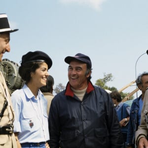 Archives - En France, Rémy Julienne en compagnie de Louis de Funès, Guy Grosso et Elisabeth Etienne, sur le tournage du film "Le Gendarme et les gendarmettes en novembre 1982