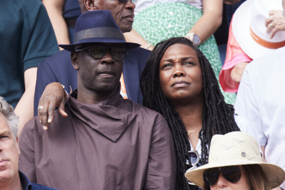 Lilian Thuram et sa femme Kareen Guiock Thuram - Célébrités dans les tribunes de la finale Dames des Internationaux de Tennis de Roland Garros à Paris le 8 juin 2024. © Jacovides-Moreau/Bestimage