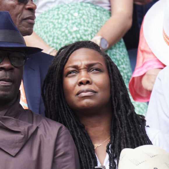 Lilian Thuram et sa femme Kareen Guiock Thuram - Célébrités dans les tribunes de la finale Dames des Internationaux de Tennis de Roland Garros à Paris le 8 juin 2024. © Jacovides-Moreau/Bestimage