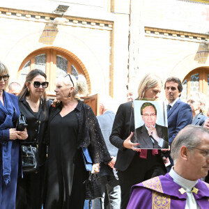 Catherine Falgayrac (femme du défunt), famille et proche - Sorties des obsèques de Nonce Paolini en l'église Saint-Honoré-d'Eylau, 66 bis, avenue Raymond-Poincaré à Paris, France, le 23 juillet 2024.