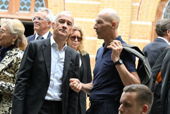 Gilles Bouleau et Nicolas Canteloup - Sorties des obsèques de Nonce Paolini en l'église Saint-Honoré-d'Eylau, 66 bis, avenue Raymond-Poincaré à Paris, France, le 23 juillet 2024.