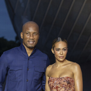 Didier Drogba, Gabrielle Lemaire - Photocall du dîner "Prelude pour les JO" à la Fondation Vuitton à Paris, France, le 25 juillet 2024. © Olivier Borde/Bestimage