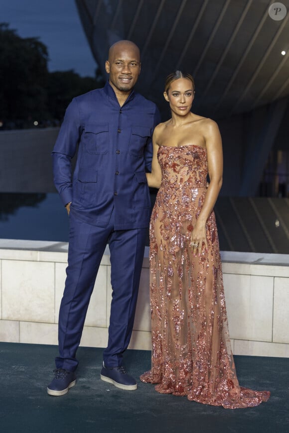 Didier Drogba, Gabrielle Lemaire - Photocall du dîner "Prelude pour les JO" à la Fondation Vuitton à Paris, France, le 25 juillet 2024. © Olivier Borde/Bestimage