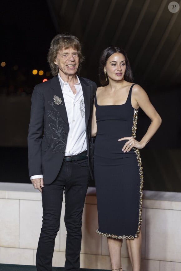 Mick Jagger et sa compagne Melanie Hamrick - Photocall du dîner "Prelude pour les JO" à la Fondation Vuitton à Paris, France, le 25 juillet 2024. © Olivier Borde/Bestimage