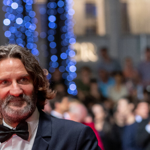 Frédéric Beigbeder - Montée des marches du film " Fumer Fait Tousser " lors du 75ème Festival International du Film de Cannes. Le 21 mai 2022 © Cyril Moreau / Bestimage 