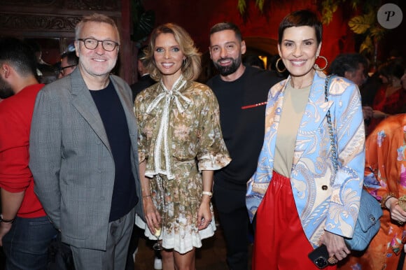 Laurent Ruquier, Sylvie Tellier, Hugo Manos et Cristina Cordula assistent au lancement du livre de Sylvie Tellier "Couronne et préjugés" et à la célébration de son 46e anniversaire organisés par Five Eyes Production au Buddha Bar, le 28 mai 2024. Jérôme Dominé/ABACAPRESS.COM