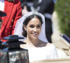 Ainsi, selon le journaliste expert royal, le prince William "ne voulait pas" que Meghan Markle porte les bijoux de Diana à son mariage 
Le prince Harry, duc de Sussex, et Meghan Markle, duchesse de Sussex, en calèche à la sortie du château de Windsor après leur mariage le 19 mai 2018 