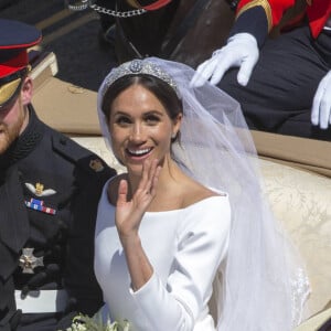 Le prince Harry, duc de Sussex, et Meghan Markle, duchesse de Sussex, en calèche au château de Windsor après la cérémonie de leur mariage au château de Windsor, Royaume Uni, le 19 mai 2018. 