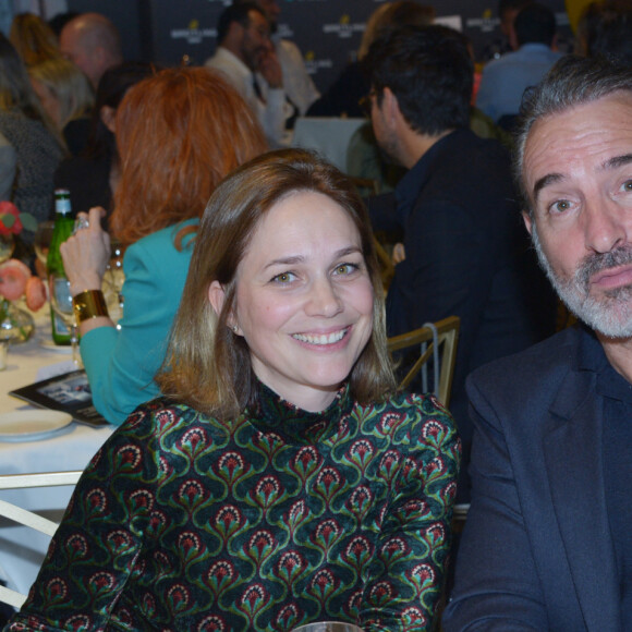 Jean Dujardin et sa femme Nathalie Péchalat (nouvelle présidente de l'association "Premiers de Cordée") - Dîner de charité Breitling à la Samaritaine pour l'association "Premiers de Cordée" à Paris le 4 avril 2024.  © Rachid Bellak/Bestimage 