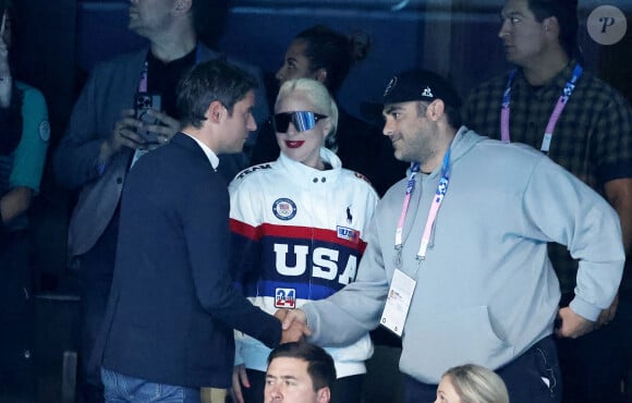 Gabriel Attal et Lady Gaga, Michael Polansky - Lady Gaga et son fiancé Michael Polansky assistent à la victoire de Léon Marchand sur 400 m 4 nage lors des Jeux Olympiques de Paris 2024 (JO) à Paris La Defense Arena à Nanterre le 28 juillet 2024. © Dominique Jacovides-Pierre Perusseau/Bestimage 