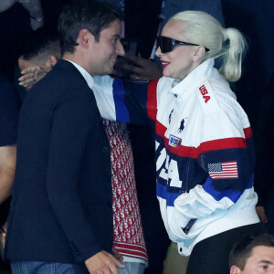 Gabriel Attal et Lady Gaga - Lady Gaga et son fiancé Michael Polansky assistent à la victoire de Léon Marchand sur 400 m 4 nage lors des Jeux Olympiques de Paris 2024 (JO) à Paris La Defense Arena à Nanterre le 28 juillet 2024. © Dominique Jacovides-Pierre Perusseau/Bestimage 