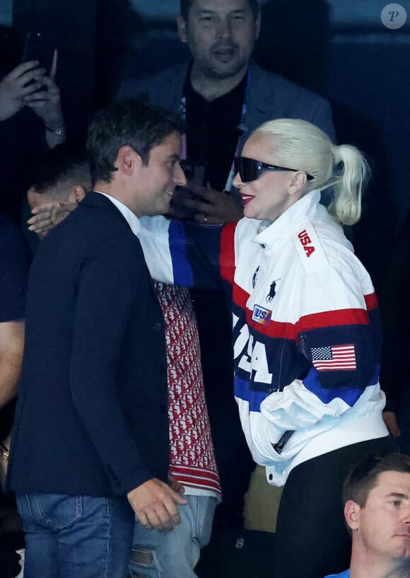 Gabriel Attal et Lady Gaga - Lady Gaga et son fiancé Michael Polansky assistent à la victoire de Léon Marchand sur 400 m 4 nage lors des Jeux Olympiques de Paris 2024 (JO) à Paris La Defense Arena à Nanterre le 28 juillet 2024. © Dominique Jacovides-Pierre Perusseau/Bestimage 