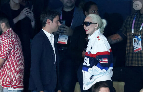 Gabriel Attal et Lady Gaga - Lady Gaga et son fiancé Michael Polansky assistent à la victoire de Léon Marchand sur 400 m 4 nage lors des Jeux Olympiques de Paris 2024 (JO) à Paris La Defense Arena à Nanterre le 28 juillet 2024. © Dominique Jacovides-Pierre Perusseau/Bestimage 