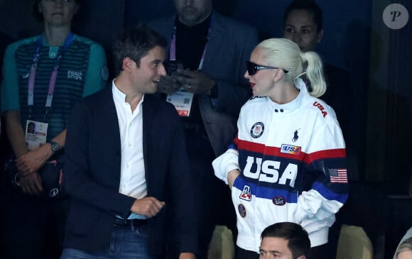 Gabriel Attal et Lady Gaga - Lady Gaga et son fiancé Michael Polansky assistent à la victoire de Léon Marchand sur 400 m 4 nage lors des Jeux Olympiques de Paris 2024 (JO) à Paris La Defense Arena à Nanterre le 28 juillet 2024. © Dominique Jacovides-Pierre Perusseau/Bestimage 