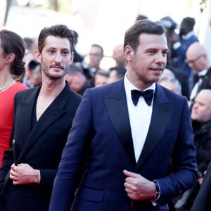 Julie de Bona, Pierre Niney, Laurent Lafitte - Montée des marches du film " Le comte de Monte-Cristo " lors du 77ème Festival International du Film de Cannes, au Palais des Festivals à Cannes. Le 22 mai 2024 © Jacovides-Moreau / Bestimage 