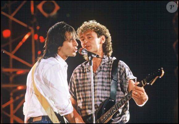 Archives - Jean Jacques Goldman et Michael Jones en duo sur scène.