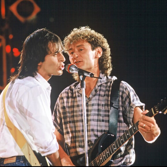 Archives - Jean Jacques Goldman et Michael Jones en duo sur scène.