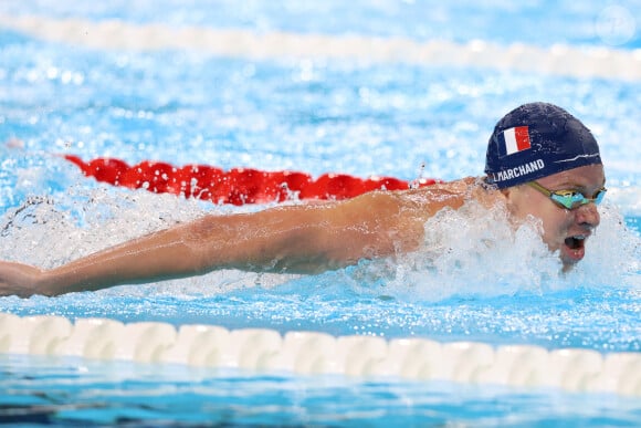 July 31, 2024, Paris, Ile-De-France, France: LEON MARCHAND of France celebrates winning the Swimming Men's 200m Breaststroke and setting up a new olympic record in 2:05.85 in final at the Paris 2024 Olympic Games at Paris La Defense Arena in Paris, France (Credit Image: © Mickael Chavet/ZUMA Press Wire)