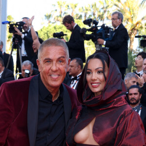 Samy Naceri et Sofia Athena - Montée des marches pour la cérémonie de clôture du 77ème Festival International du Film de Cannes au Palais des Festivals à Cannes. Le 25 mai 2024 © Jacovides-Moreau / Bestimage 