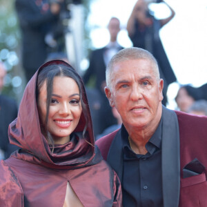 Samy Naceri et Sofia Athena - Montée des marches pour la cérémonie de clôture du 77ème Festival International du Film de Cannes au Palais des Festivals à Cannes, le 25 mai 2024. © Rachid Bellak/Bestimage  Climbing the steps for the closing ceremony of the 77th Cannes International Film Festival at the Palais des Festivals in Cannes, May 25, 2024.