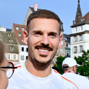 Matt Pokora est évoqué comme nouveau parrain, et pourrait succéder à Vitaa... Mais selon nos informations cela serait faux
Matt Pokora assiste au relais de la flamme olympique à Strasbourg, le 26 juin 2024. Nicolas Roses/ABACAPRESS.COM