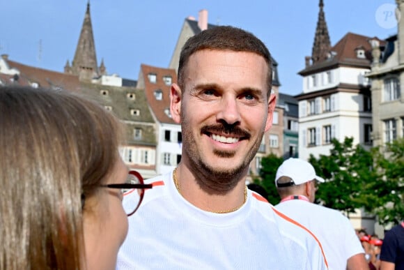 Matt Pokora est évoqué comme nouveau parrain, et pourrait succéder à Vitaa... Mais selon nos informations cela serait faux
Matt Pokora assiste au relais de la flamme olympique à Strasbourg, le 26 juin 2024. Nicolas Roses/ABACAPRESS.COM