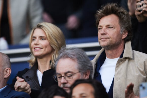 Alice Taglioni et son compagnon Laurent Delahousse dans les tribunes de la demi-finale retour de Ligue des champions entre le PSG face au Borussia Dortmund (0-1) au Parc des Princes à Paris le 7 mai 2024. © Cyril Moreau/Bestimage