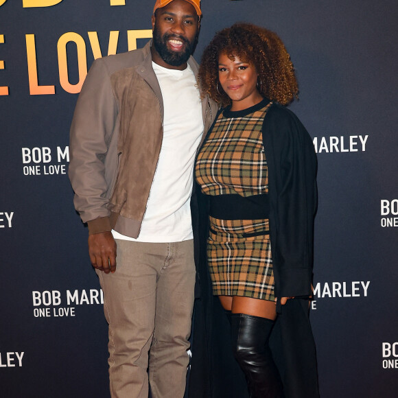 Teddy Riner et sa femme Luthna Plocus - Première du film "Bob Marley One Love" au Grand Rex à Paris le 1 fevrier 2024. © Coadic Guirec/Bestimage 