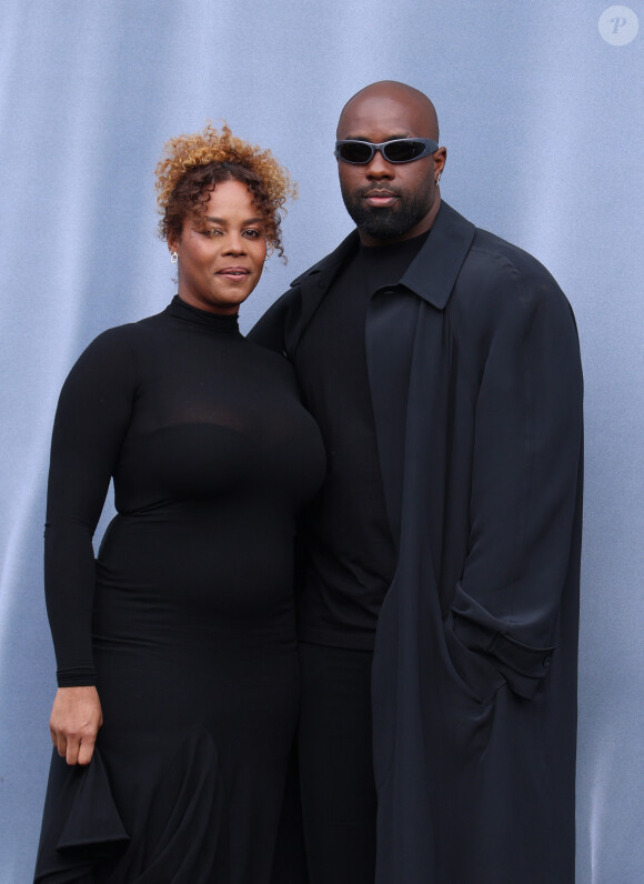 Teddy Riner et sa femme Luthna Plocus - Arrivées au défilé Balenciaga mode femme automne / hiver 2024-2025 à la Sorbonne Nouvelle lors de la Fashion Week de Paris (PFW), à Paris, France, le 3 mars 2024. © Denis Guignebourg/Bestimage 