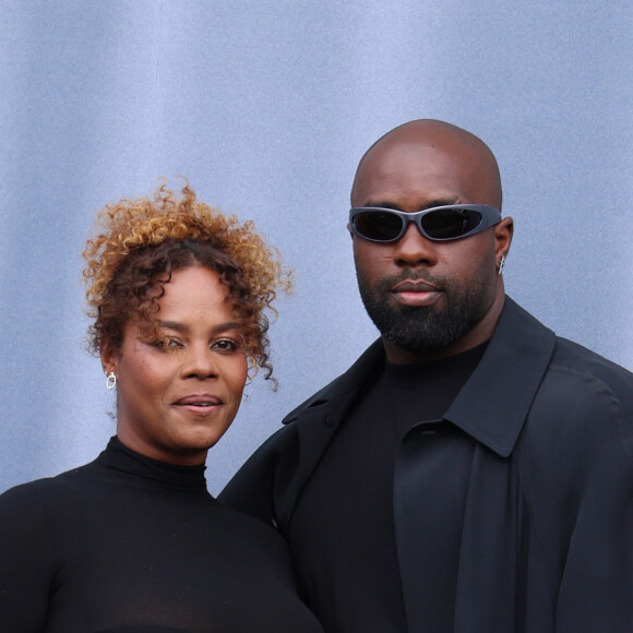 Teddy Riner et sa femme Luthna Plocus - Arrivées au défilé Balenciaga mode femme automne / hiver 2024-2025 à la Sorbonne Nouvelle lors de la Fashion Week de Paris (PFW), à Paris, France, le 3 mars 2024. © Denis Guignebourg/Bestimage 